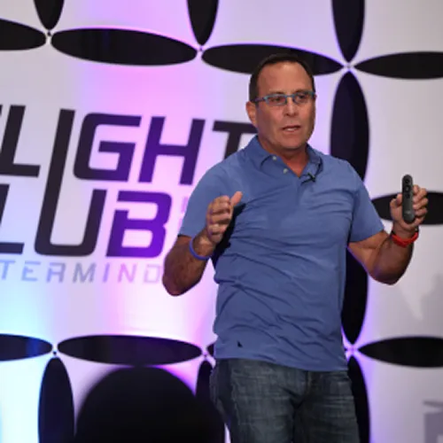 A member speaking on stage