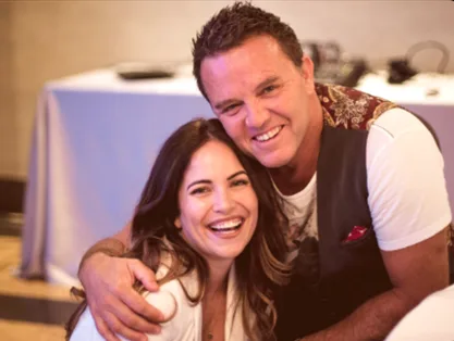 Glen Ledwell with a smiling member at an event